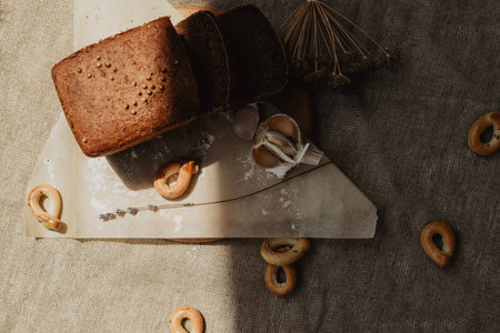 Rustic still life with bread, flour, salt and lavenderの写真素材