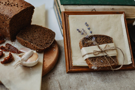 Homemade bread with lavender and spices, rustic still lifeの写真素材