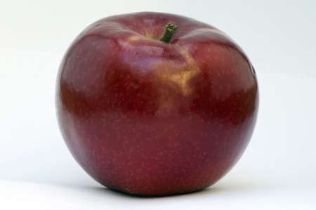 A juicy red apple isolated on white.の写真素材