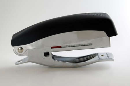 A unique styled stapler on white background.の写真素材