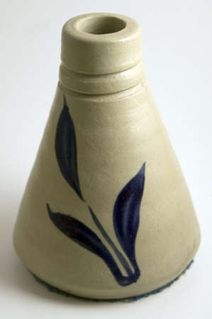 Ceramic pen holder on white.の写真素材