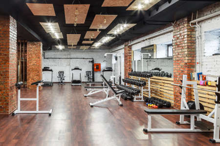 Interior view of a gym with equipment.の写真素材