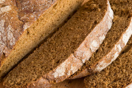 Slices of rye bread close up, top view