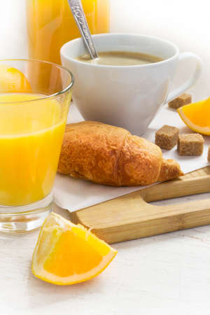 Croissants and coffee and orange juice.の写真素材