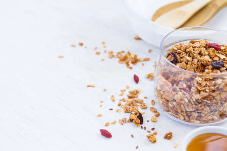 healthy breakfast. Granola on white background, space for text.の写真素材