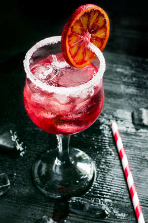 glass of refreshing citrus cocktail with ice.の写真素材