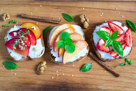 Fruit Bruschetta with spices and nuts. Top view の写真素材