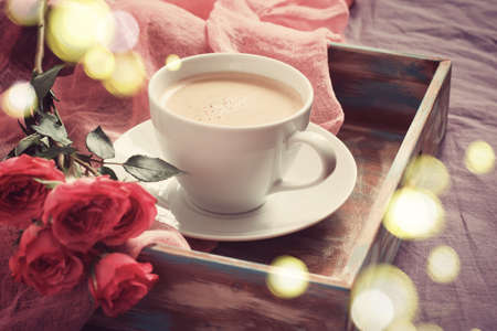 Cup of coffee, cookies and rose. Concept of Valentine's Day breakfast, tintedの写真素材