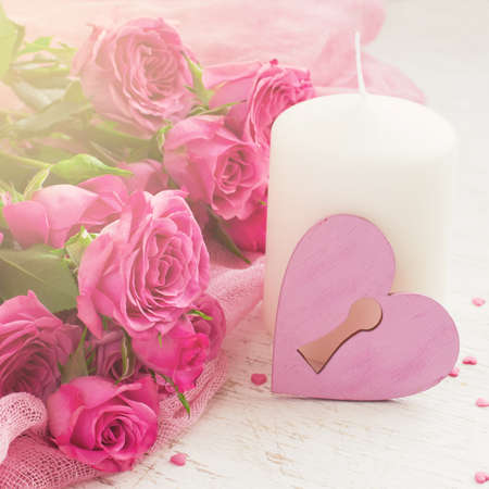 Valentin Day card with roses and candle.の写真素材