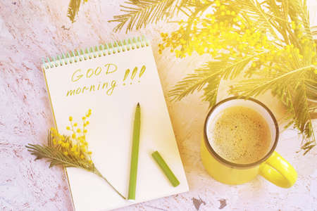 Morning coffee, a bouquet of mimosas and a good morning's wish, tonedの写真素材