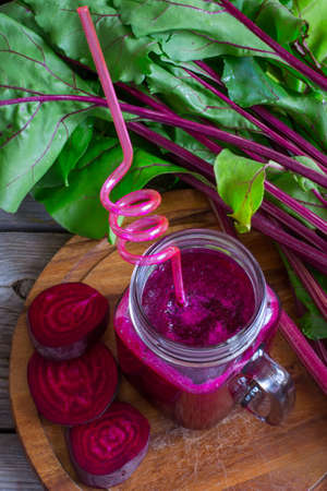 Fresh Smoothies of beet with a glass jar, selective focus.