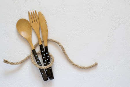 Selection of bamboo cutlery on white background.の写真素材
