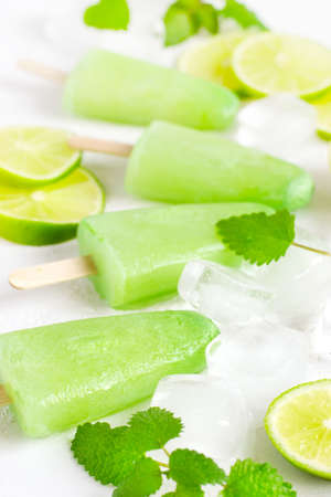 Healthy lime mint ice cream with fresh lime slices And ice cubes. Selective focus
