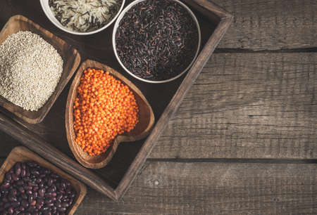 Selection of a variety of delicious and healthy cereals. Top view with copy spaceの写真素材