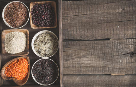 Selection of a variety of delicious and healthy cereals. Top view with copy spaceの写真素材
