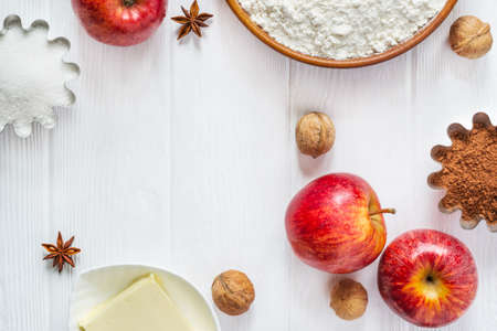 Ingredients for baking. Selection for Autumn pie or muffins with Apples and cinnamon, flat lay.の写真素材