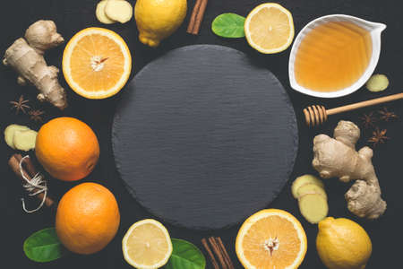 Ingredients for cooking healthy Natural hot beverage And cutting board in the center.の写真素材