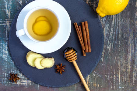 Ginger hot immunity boosting Vitamin natural drink With Lemon, honey and cinnamon and ingredients.の写真素材