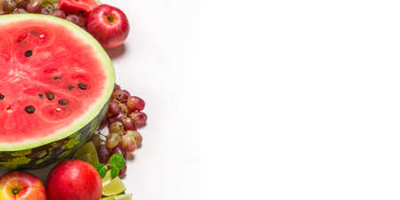 Watermelon and various fruits on white background.の写真素材