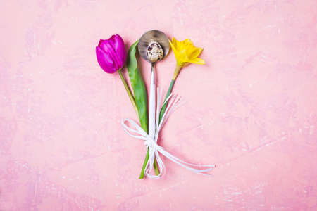 Spring Easter Table setting with flowers and Eggs.の写真素材