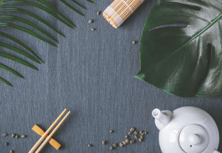 Asian food background. Chopsticks and soy sauce.の写真素材