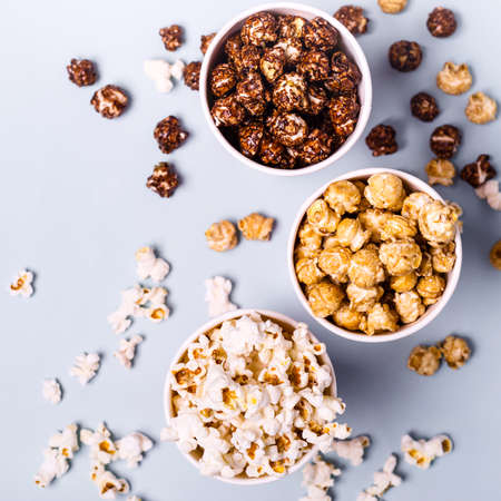 set of sweet and salted popcorn in paper cups..の写真素材