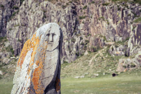 Chui Deer stone Adyr-Kan. Ancient stone statue with face. Altai Russia.の写真素材