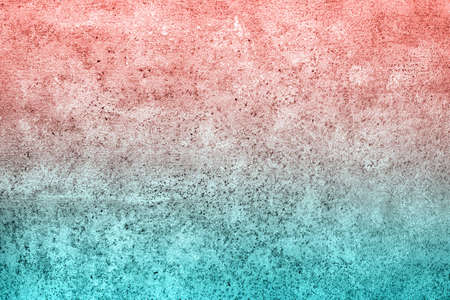 Turquoise living coral gradient concrete plaster background with small spots.