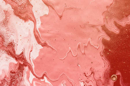 Acrylic Fluid Art. Red pink waves and curls. Abstract creative background or texture.の写真素材