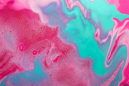 Acrylic Fluid Art. Turquoise curls on red waves and pink inclusions. Abstract modern background or...