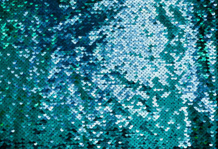 Shiny  made of turquoise sequins.