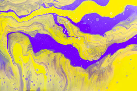 Glowing yellow and purple waves with gold inclusion.