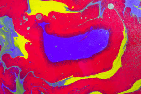 Purple spot against the background of red and yellow waves. Abstract background or texture. Acrylic...