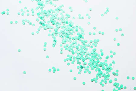 Pastel mint confetti stars on a white background. Holiday Party Concept.の写真素材