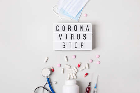 Lightboard with words Coronavirus stop. Severe acute respiratory syndrome. Coronavirus treatment concept.の写真素材