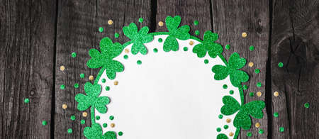St. Patricks Day background. Happy St.Patricks Day shamrock and confetti frame, banner format.の写真素材