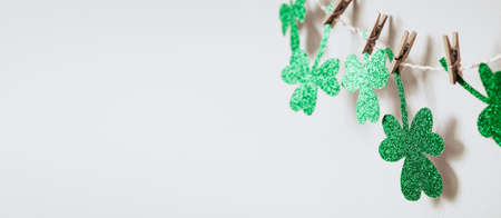 Happy St. Patricks day  with Green glitter shamrocks decoration, banner formatの写真素材