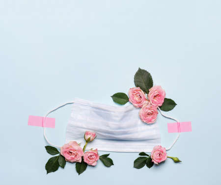 Thank You text with medical mask and roses flowers on blueの写真素材