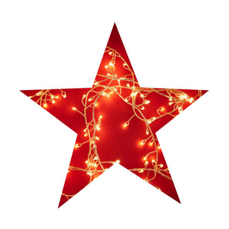 Creative layout made of paper star hole and glowing garland. Isolate on white for your design.