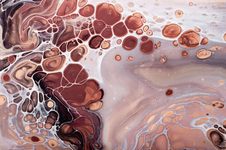 Acrylic Fluid Art. Brown bubbles and beige waves Abstract stone background or texture.