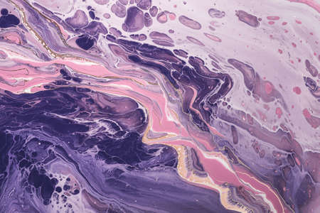 Fluid Art. Pink and lilac waves of spreading paint. Marble effect background or texture