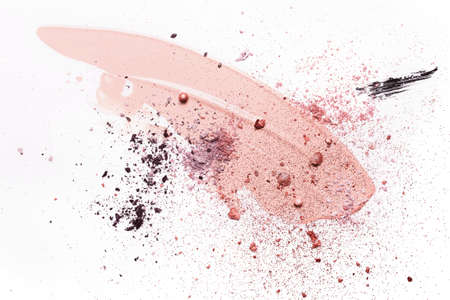 Beauty concept with abstract Smudged makeup foundation, broken shadows and sparkles on white backgroundの写真素材