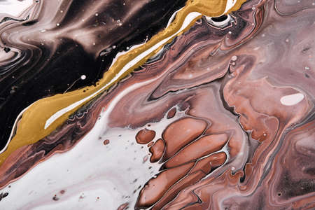 Acrylic Fluid Art. Brown and black waves with liquid golden curve.