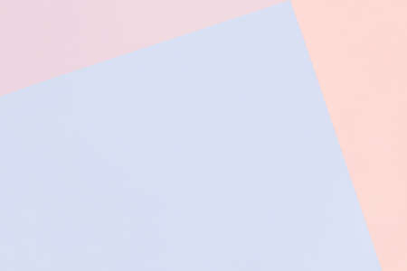 Paper geometric pastel background in pink and blue colors with copy spaceの写真素材