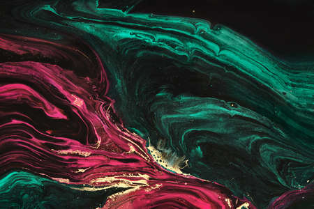 Fluid Art. Metallic Gold in abstract green and purple wave. Marble effect background or textureの写真素材