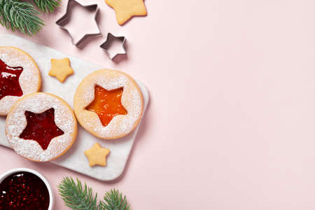 Traditional Linzer cookies with red and yellow jam. Cooking Christmas backgroundの写真素材