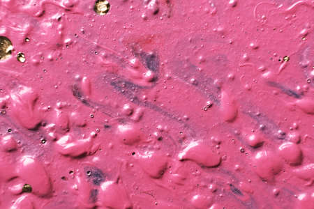 Fluid Art. Bubble paint abstraction. Tactile bumpy pink paint background or texture close-upの写真素材