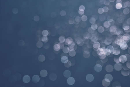 Dark gray grunge background texture with bokeh. Film overlay effect