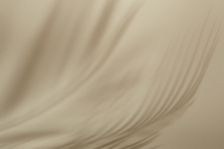 Natural palm leaves shadow on beige paper background. Abstract neutral tropical backdrop. Soft lightの写真素材