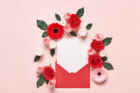 Red envelope with Romantic love letter mockup and flowers on pink background